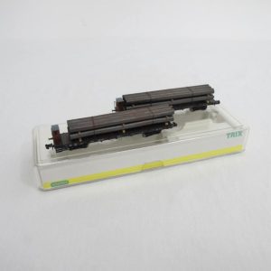 Car set with two platform cars, type SSw 07, each 4-axle, black, loaded with tubes (aged)