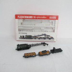 Wagon set with a crane wagon with 90 t steam crane, 6-axle, a counterweight wagon, 4-axle, and two crane protection wagons, each 2-axle